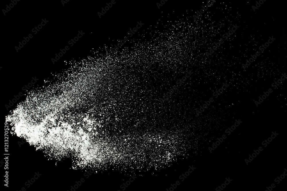 Fluffy White snow splash flying or throwing in mid air. Snowfall on Black background isolated. Snow dust element falling over dark night Fluffy White snow splash flying or throwing in mid air. Snowfall on Black background isolated. Snow dust element falling over dark night