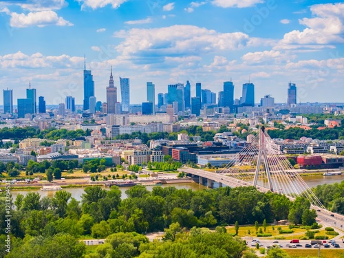 Photos Modern skyline of Warsaw with the Vistula River and greenery on a sunny day