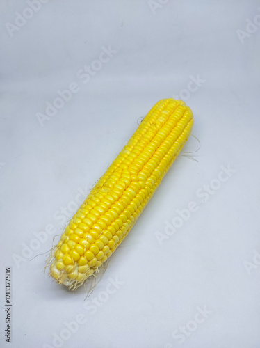 Skinless boiled corn on a white background. Jagung Manis indonesia food photo