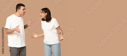 Photos Quarrelling young couple on beige background with space for text