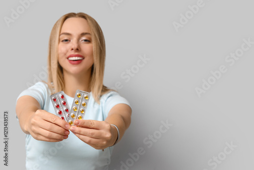 Young woman with blisters o...