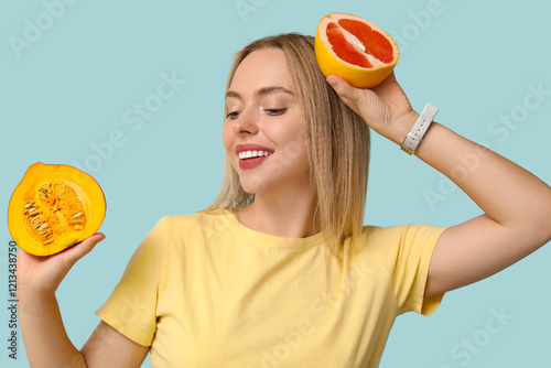 Young woman with grapefruit...