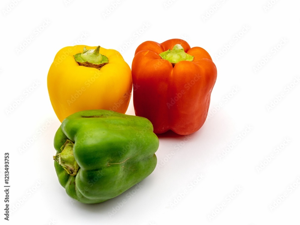 Colorful bell peppers on white background. Colorful bell peppers on white background.