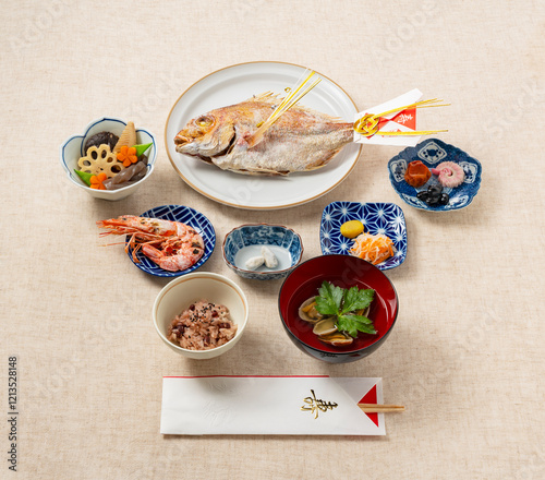 Japanese First Meal Ceremony (Okuizome) Set Placed on a Cloth Background photo