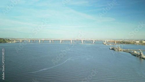 Wallpaper Mural Aerial wide pan across bridges to marine infrastructure along Carquinez Strait Regional Shoreline wetlands in Martinez, California Torontodigital.ca