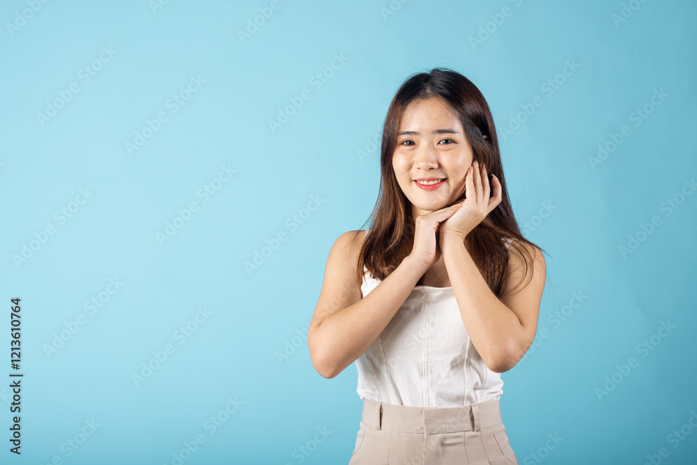 Skin care and Beauty concept. Asian young woman with beauty face touching healthy facial skin, portrait happy female with natural makeup and healthy face Skin care and Beauty concept. Asian young woman with beauty face touching healthy facial skin, portrait happy female with natural makeup and healthy face