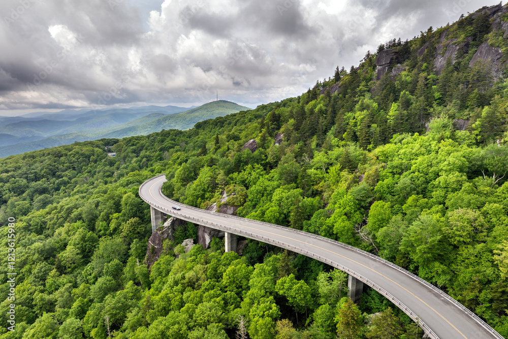 Linn Cove Viaduct road bridge in North Carolina Appalachian mountains, USA. Blue Ridge Parkway American highway in summer rain season Linn Cove Viaduct road bridge in North Carolina Appalachian mountains, USA. Blue Ridge Parkway American highway in summer rain season