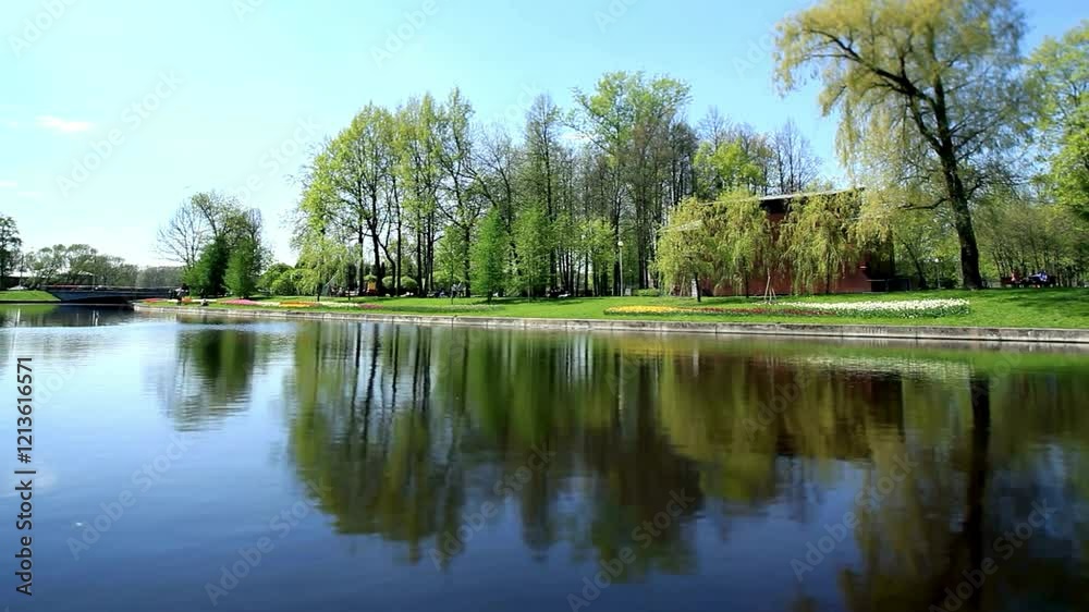 Experience the tranquility of spring as it unfolds along a scenic river. Ideal for showcasing natural beauty, peaceful waters, and seasonal landscapes Experience the tranquility of spring as it unfolds along a scenic river. Ideal for showcasing natural beauty, peaceful waters, and seasonal landscapes