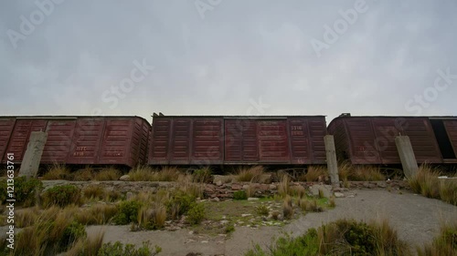 Time lapse of Abandoned wagon at the train station in the town of Sumbay, Arequipa city. photo