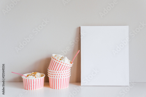 Stylish boxes with ice cream, white empty canva. Mockup for design, template