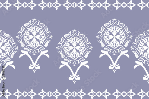Damask seamless pattern in the style of baroque. Traditional classic purple and white ornament. Design for elaborate borders, tiles, ceramic pottery, and clothing.