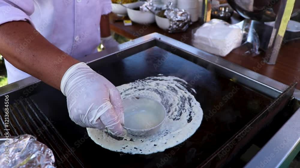 close up of cooking indian food Dhosa close up of cooking indian food Dhosa