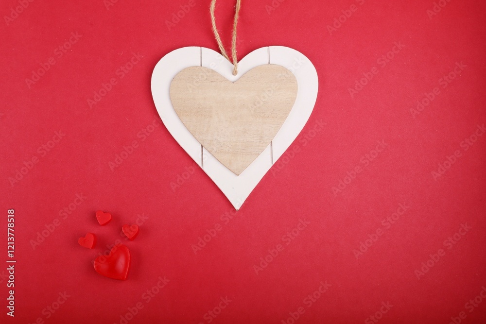 Red heart shapes and an empty wooden heart on red background. Love, heart, Valentine's Day Red heart shapes and an empty wooden heart on red background. Love, heart, Valentine's Day