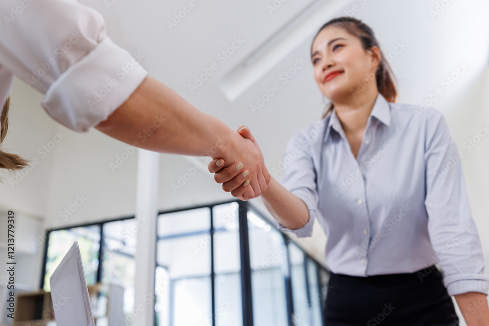 Close up of two Business handshake for teamwork businesspeople shaking hands after a deal contract is done. Close up of two Business handshake for teamwork businesspeople shaking hands after a deal contract is done.