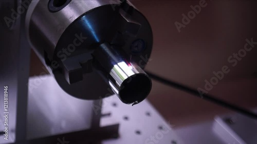 Laser Engraving on a Cylindrical Metal Surface photo