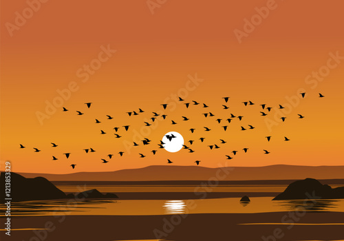 
Flock of birds flying over the beach