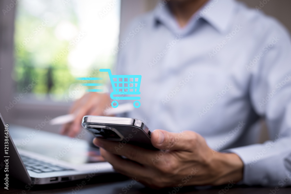 Fototapeta premium Businessman hold smartphone with online shopping concept, marketplace website with virtual interface of online Shopping cart part of the network, Online shopping business with selecting shopping cart.