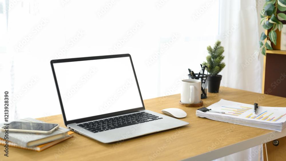 Modern workspace with a laptop, smartphone, and business paperwork on wooden desk Modern workspace with a laptop, smartphone, and business paperwork on wooden desk