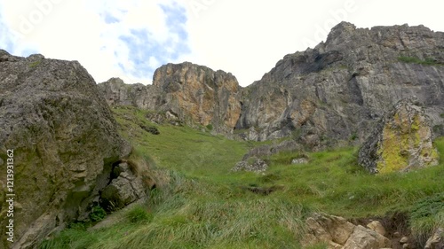 Paradise Rocks is next to where the Raisko Praskalo waterfall flows. Located near Rai Hut, Botev Peak, and Kalofer Town. Raiski skali. Cliffs. Stara Planina mountain. Central Balkan National Park. photo