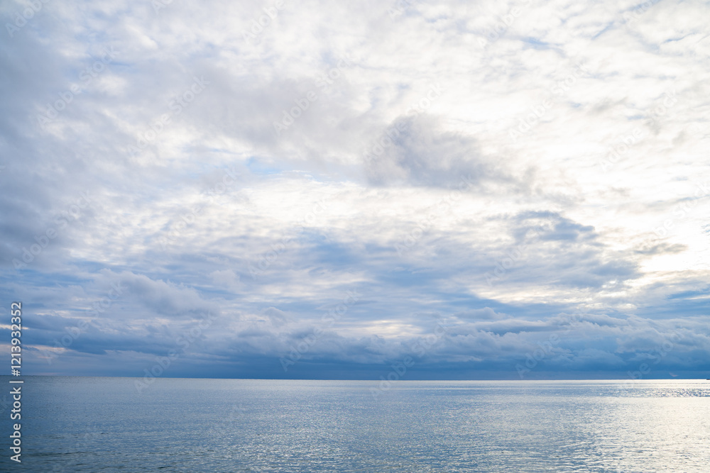 Beautiful seascape view bright blue sky with clouds over soft sea waves. Scenery of sea and cloudy sky. Beautiful seascape view bright blue sky with clouds over soft sea waves. Scenery of sea and cloudy sky.