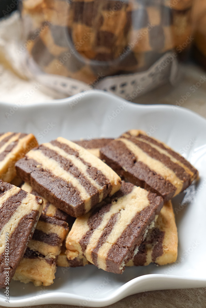 A plate of Striped Butter Cookies atau Biskut Belang. A plate of Striped Butter Cookies atau Biskut Belang.