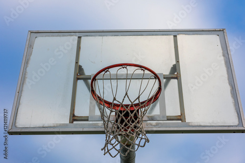 Close-Up of Outdoor Basketball Hoop in California Park.