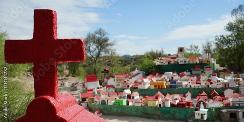 фотографія Difunta Correa Oratory with red cross and miniature houses in Vallecito, San Jua