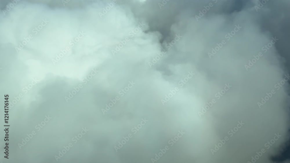 An unique pilot’s perspective through his eyes passing through a cottony cumulus clouds during the approach to Ibiza’s airport, with an elevated view of the airport and coast. 4K 60FPS An unique pilot’s perspective through his eyes passing through a cottony cumulus clouds during the approach to Ibiza’s airport, with an elevated view of the airport and coast. 4K 60FPS