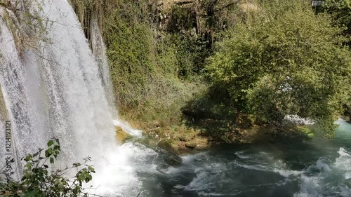 Fast flowing water from a mountain waterfall