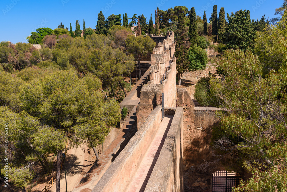Malaga, Spain - August 06, 2024: Walls and bastion of the castle fort Gibralfaro in Malaga. Castillo de Gibralfaro.