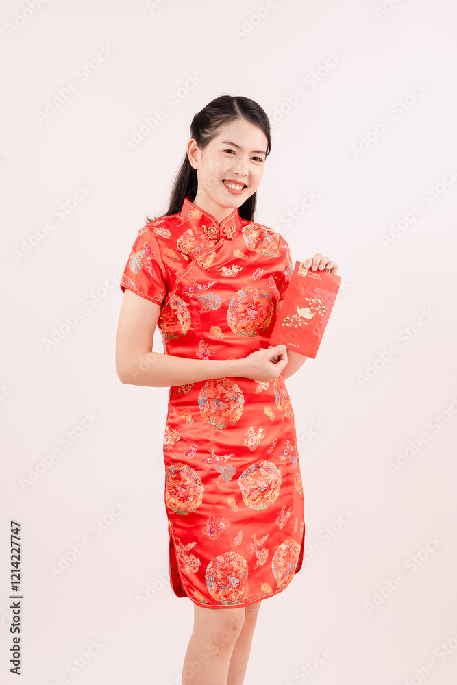 Chinese New Year theme, A young mother wearing Chinese traditional dress. Chinese New Year theme, A young mother wearing Chinese traditional dress.