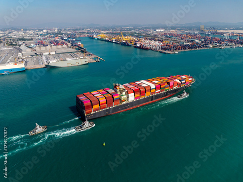 aerial view cargo logistic container ship sailing in sea, import export goods and distributing products to dealer and consumers across worldwide,