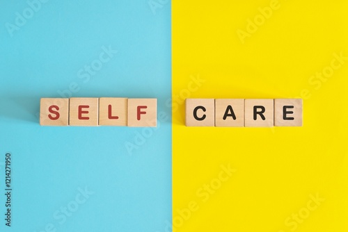 Obraz na płótnie Self care reminder and awareness wooden blocks typography in bright blue and yellow background. w salonie