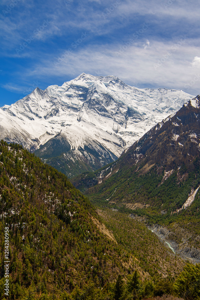 View of Annapurna II mountain in Himalayas, Pisang, Annapurna Conservation Area, Nepal. Snow capped landscape. Annapurna face. Annapurna Circuit Trek. Hiking trekking concept. View of Annapurna II mountain in Himalayas, Pisang, Annapurna Conservation Area, Nepal. Snow capped landscape. Annapurna face. Annapurna Circuit Trek. Hiking trekking concept.