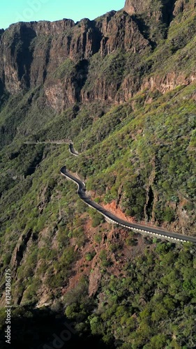 Vertical drone shot Landscape of the Masca valley at sunset in Tenerife, Canary island, Spain. Scenic mountain landscape road
