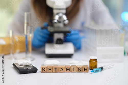 Obraz na płótnie An investigative scene showcasing ketamine along with various laboratory equipment now under expert scrutiny w salonie