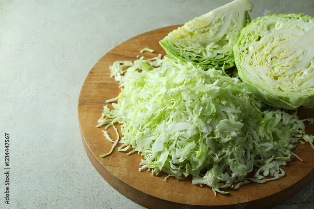 Fresh shredded cabbage on light table, closeup Fresh shredded cabbage on light table, closeup