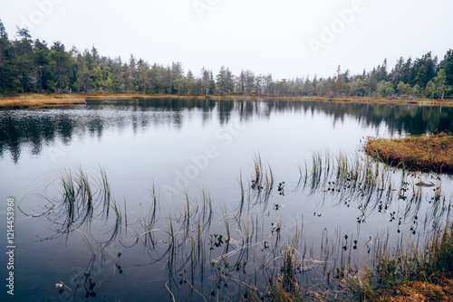 Landscape blue deep lake light sun clouds sky mountain Vottovaara Karelia Russia photo