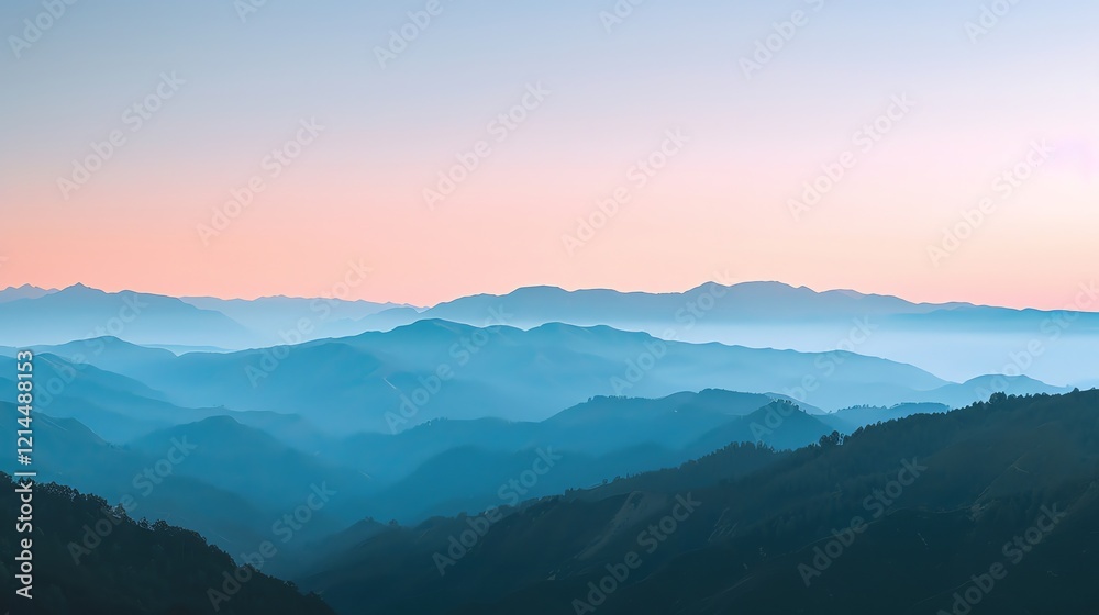 A panoramic view of a mountain range with a pink and blue sky. A panoramic view of a mountain range with a pink and blue sky.