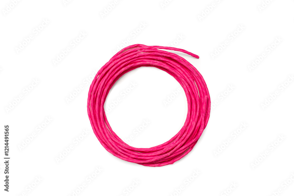 Pink twisted paper cord on a white background with copy space Pink twisted paper cord on a white background with copy space