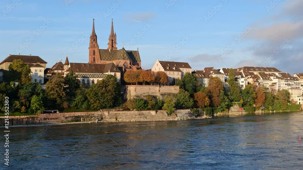 City skyline of Basel in Switzerland. The Old Town at River Rhine with Basel Minster (Basler Munster) Cathedral.