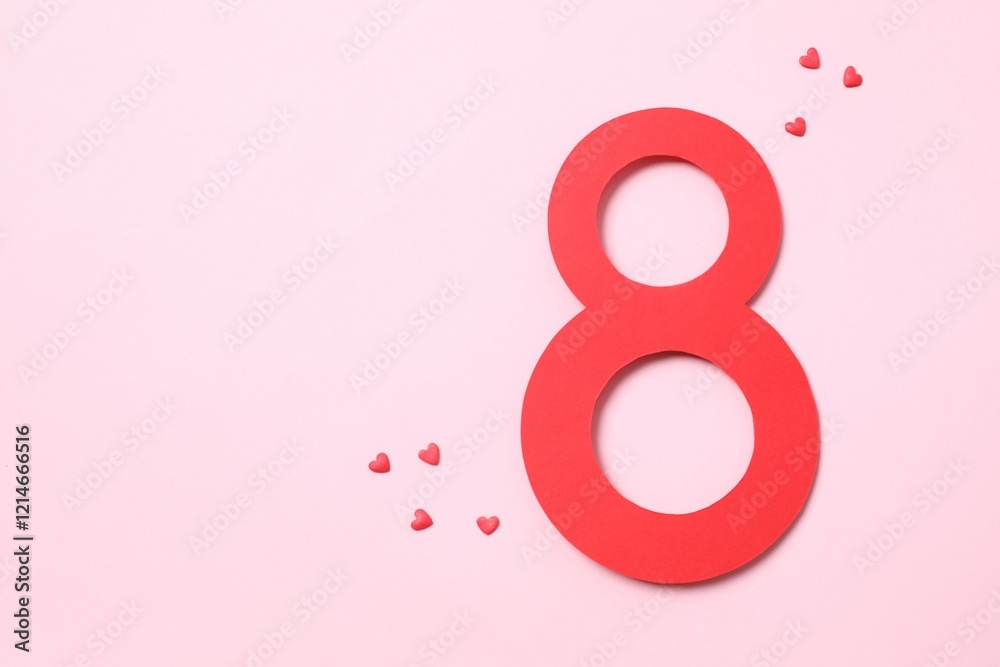 Number 8 on a red background. Minimal Women's day, March 8th or birthday concept. Flat lay, top view. Number 8 on a red background. Minimal Women's day, March 8th or birthday concept. Flat lay, top view.