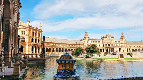 Palaces in the Spain Square in Baroque and Renaissance Revival style, around the lake. Plaza de Espana, Maria Luisa Park, Seville, Spain. 