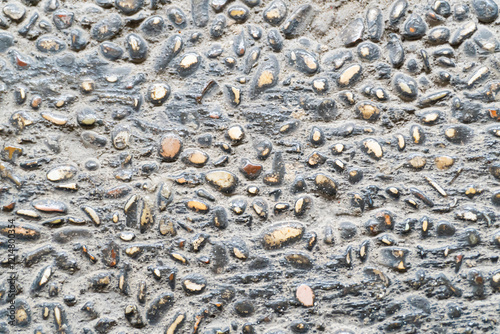 Canvastavla Close-up of a cobblestone or pebblestone concrete road surface