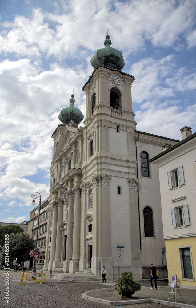 famous old church in gorizia italy (beautiful historic buildings in town square piazza) dome blue sky clouds history italian europe european famous old church in gorizia italy (beautiful historic buildings in town square piazza) dome blue sky clouds history italian europe european