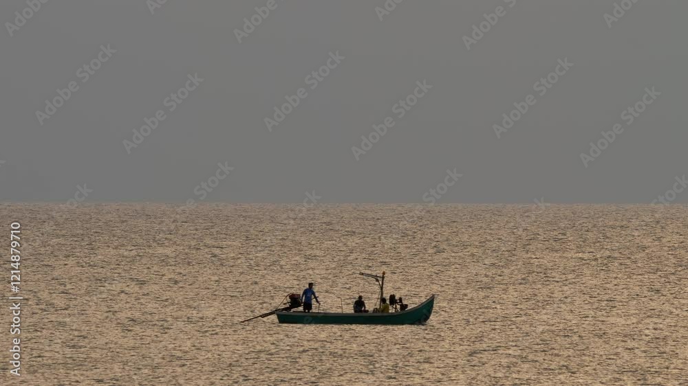 People fishermen floating in boat in backlit sunset. Unity with nature concept