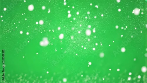 Falling Snow on Green Screen Background 4K. Isolated Snowfall and Snowflakes on a Green Screen. Chroma Key Green Screen Alpha Channel Background. Motion Graphic Video Animation