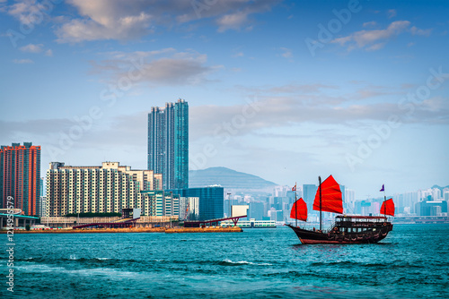 Canvas Print Hong Kong, China with a traditional junk boat in the harbor