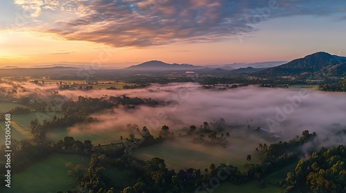 Sunrise Mist Over Rural Valley And Mountains