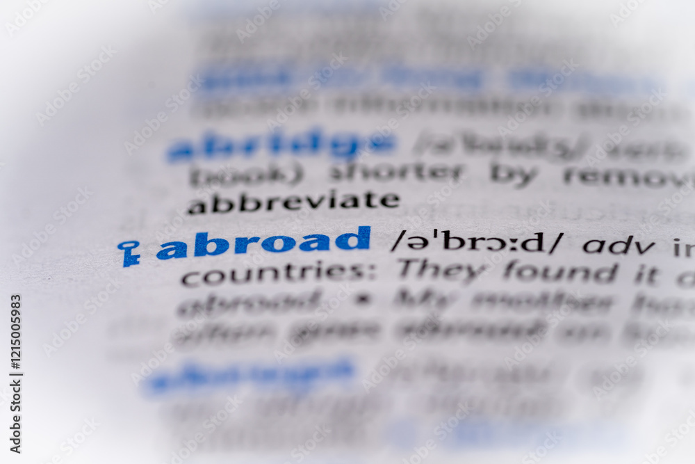 Abroad word in a dictionary. Selective focus, close up. Abroad word in a dictionary. Selective focus, close up.